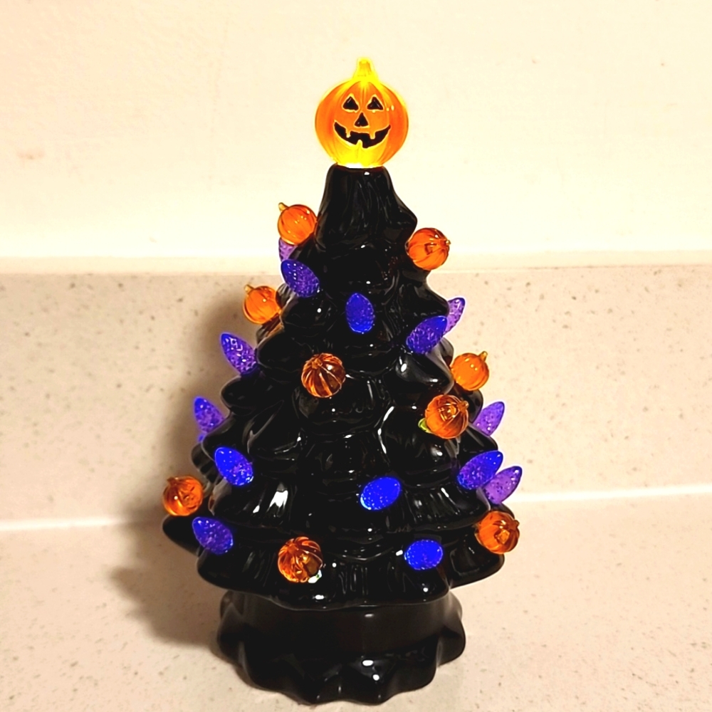 Lighted Black Tree with orange and purple Ornaments New no tags.
